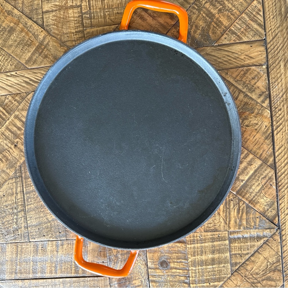 LAGOSTINA Black Cast Iron Pan with Vibrant Orange Handles